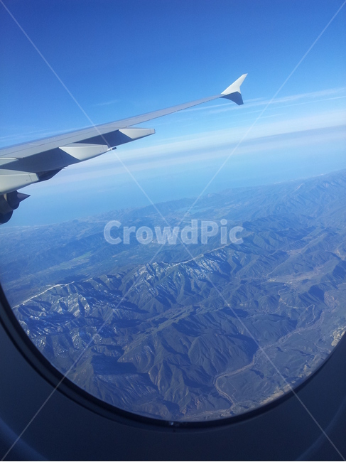 sky,sky outside the plane,cloud,nonaware,window
