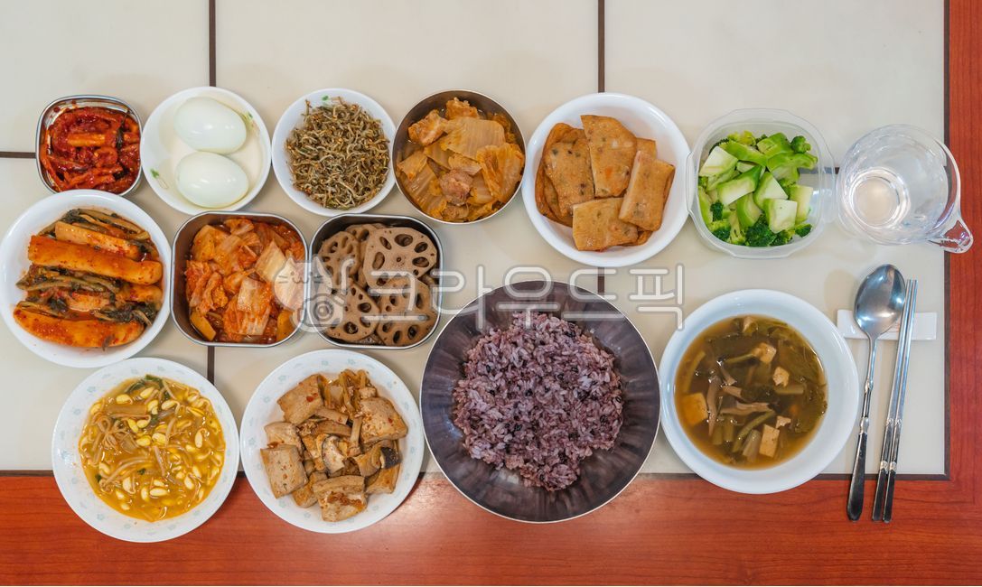 lunch,boiled egg,egg,Fish cake,chopsticks,side dish,Stewed tofu,8cheop table,11 side dishes,boiled fish cake,11cheop table,water,spoon and chopsticks,A homecooked meal,8cheop dining table,Seasoned dried radish,brunch,Spoon,One table setting,home food,Seas