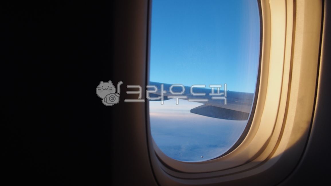 sky,flight,transpportation,cloud,airplane,window,wing,Inside the plane