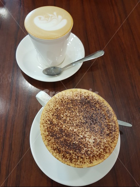 커피,카페,커피잔,카푸치노,라떼,음료,간식,카페인,여유,휴식,라떼아트,거품,시나몬파우더,코코아파우더,티타임,cafe,coffee,coffeecup,cappuccino,latte,beverage,snack,caffeine,latteart,foam,cinnamon,teatime,coffeebreak,바리스타,barista