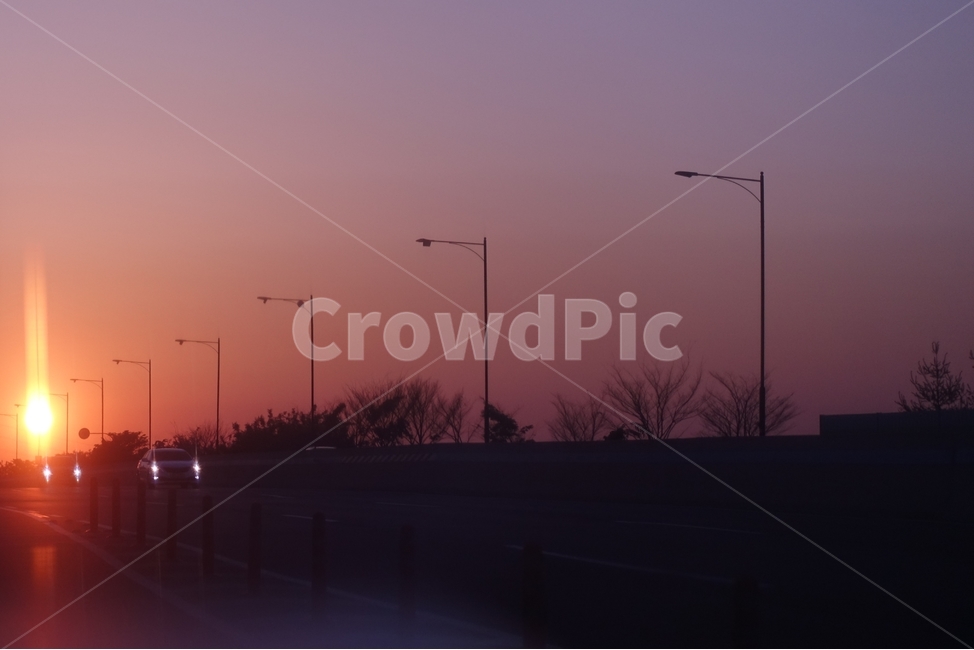 night view,sky,sunset,Magic hour,road name,cityscape,nightfall,sun,Street lamp