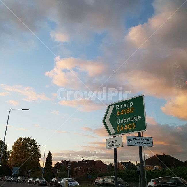 sky,distance,way home,dusk,sign,roadsign,dinner,eveningsky,road,street,road name,waybackhome,nightfall,evening,evening sky