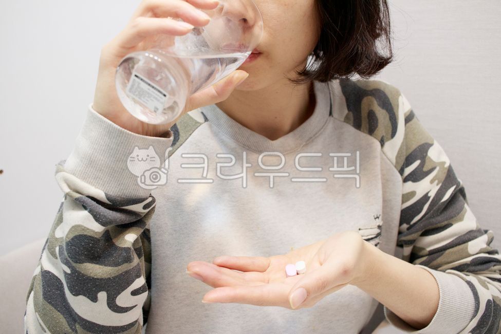 approximately,cold medicine,pill,Taking medicine,taking