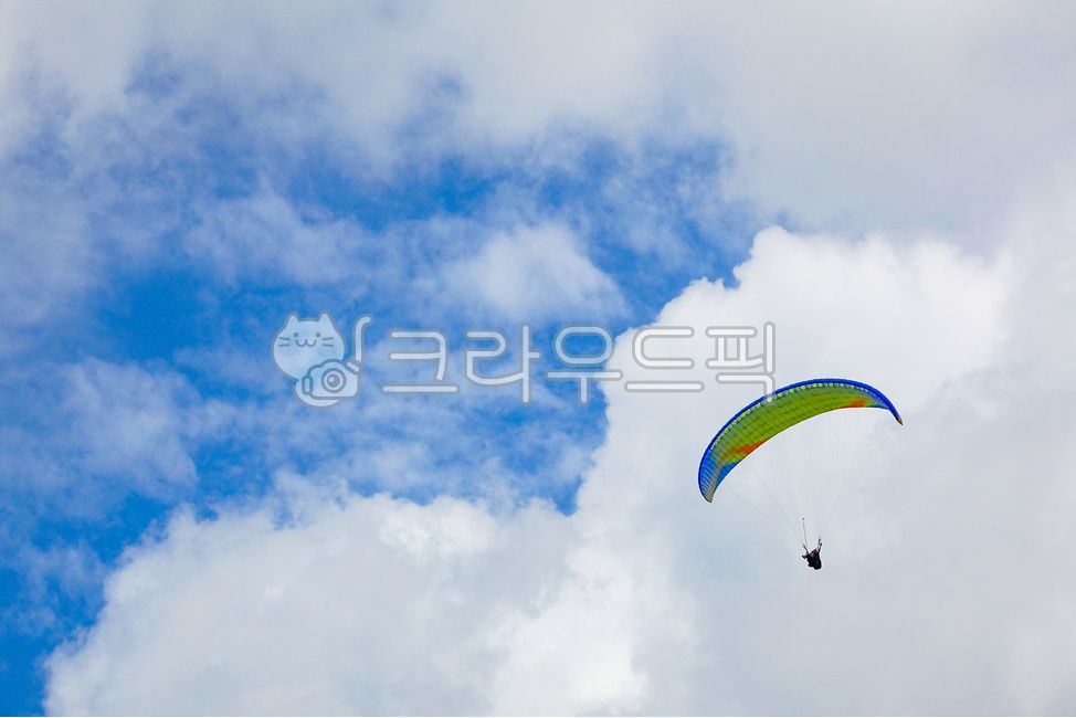 blue sky,gliding,thrill,cloud,paragliding,joy,weather,Paragliding,leisure,human,sky,sports,pleasure,cool,clear,adventure,cloudy,refreshing,person,leisure activities,leisureactivities,wind