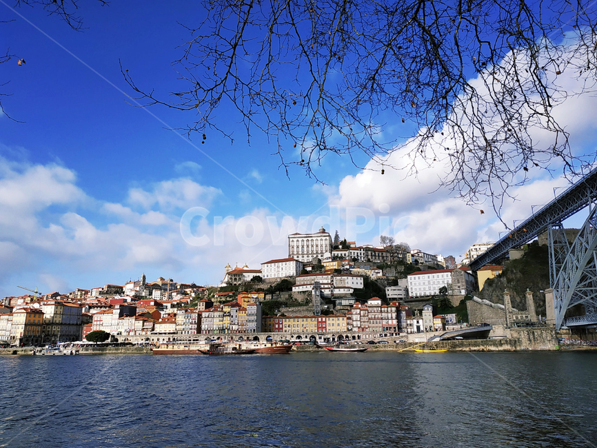 domluis bridge,blue sky,beauty,portugal,building,porto,cloud,douro river,cityscape,landmark,europe,architecture,famous,white clouds,domluisbridge,heaven,douro,blue,background,oporto,bridge,riodouro,colorful