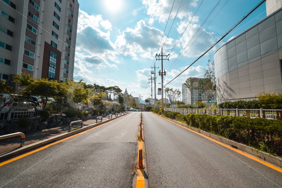 sky,cloud,wide angle,road name,building