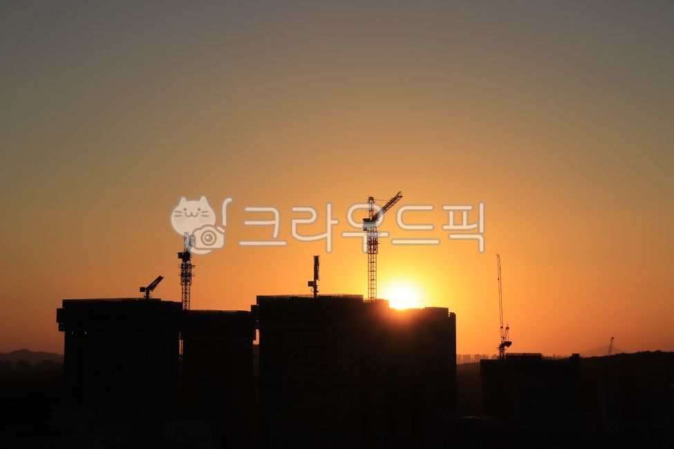 erection,Construction site,sunset,construction site,Mobile tower crane,construction crane