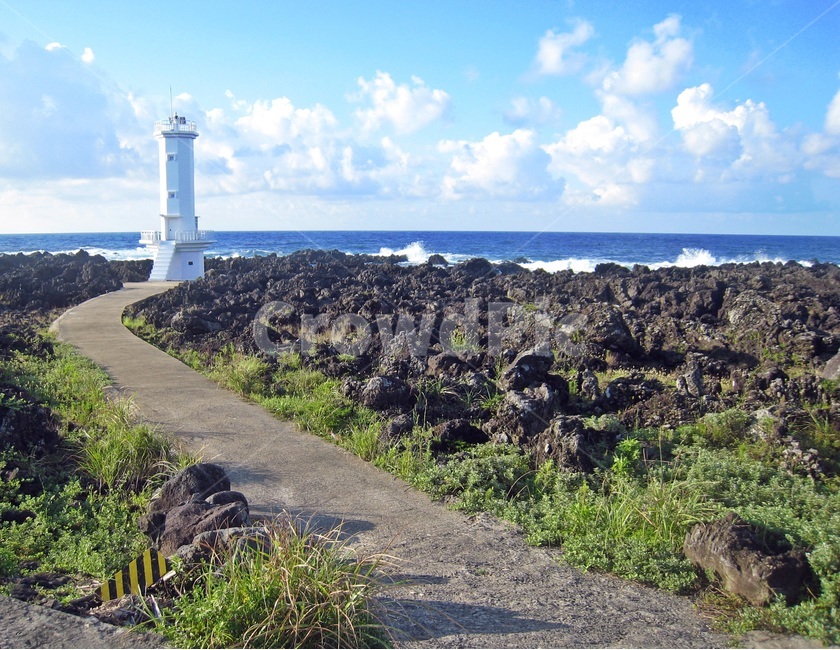 sky,volcanic island,blue sky,white lighthouse,lighthouse,jeju island,jejuisland,Lighthouse,scenery,sea,cloud,horizon,Beach,basalt,ocean,blue,background,sight