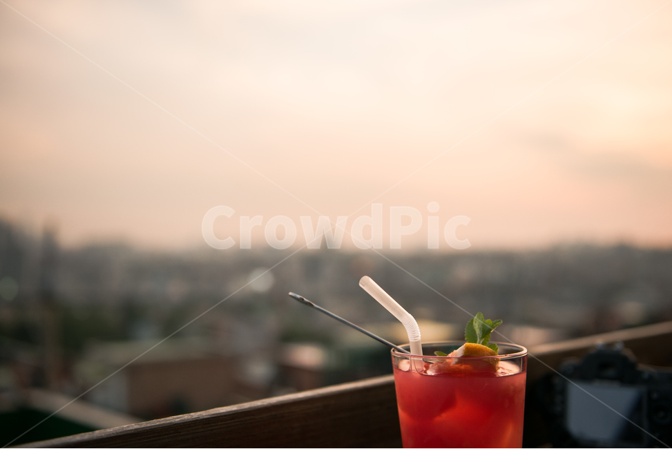rest,cool,Magic hour,dinner,early evening,Orange,summer,healing,cafe,Rooftop Cafe,beverage,sunset,sight,rooftop,cityveiw,Grapefruit Ade,cup