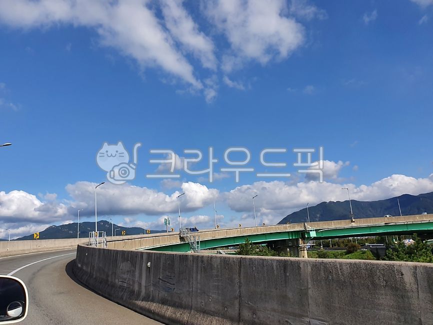 sky,blue sky,nature,tree,cloud,pier,overpass,cumulus,bridge,interchange