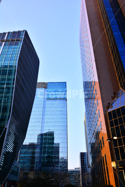 Office,evening scenery,financier,city,office,building,At sunset,street,townscape,sash,sight,cityscape,land mark,company,skyscrapers,high rise building,big city,glass,Building exterior,business,town,metropolis,high street,real estate,stock market,downtown,