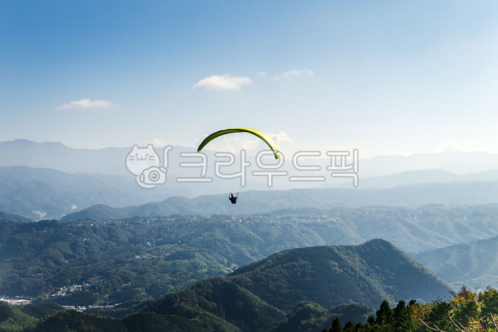 glider,mountain,high,view,action,brave,extreme,joyful,jump,sky,active,adventure,parachute,paraglider,background,wing,wind,blue sky,activity,dangerous,air,scenery,paragliding,freedom,vacation,free,leisure,sports,wallpaper,nature,copyspace,paraglide,outdoor