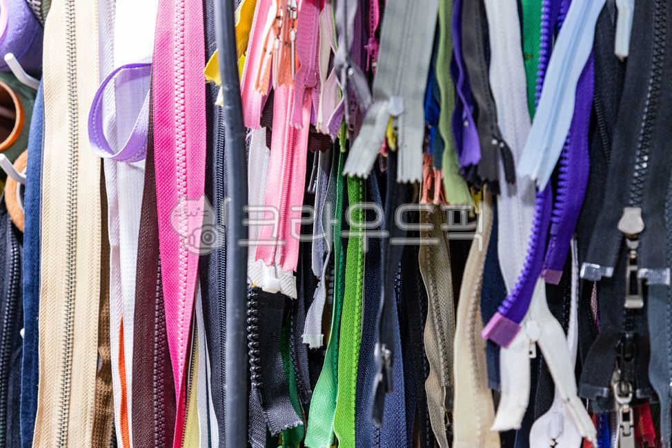 repair,clothes repair,repair materials,zipper,Brightly colored