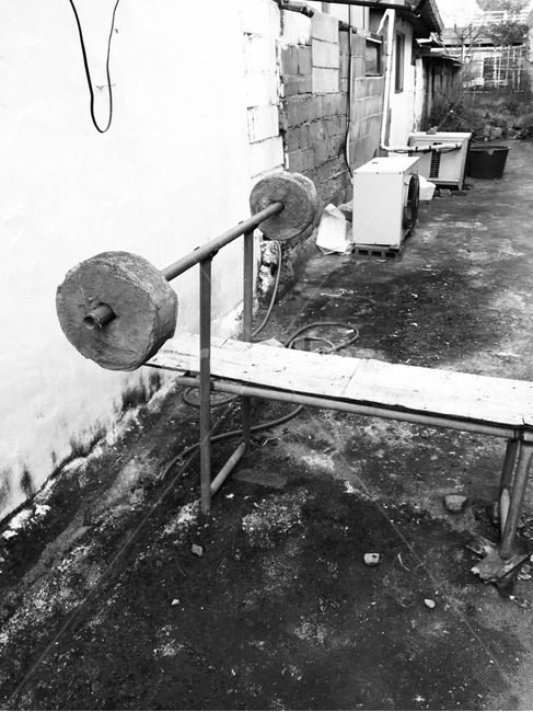 residential area,weight lifting,vintage,bench press,Old neighborhood