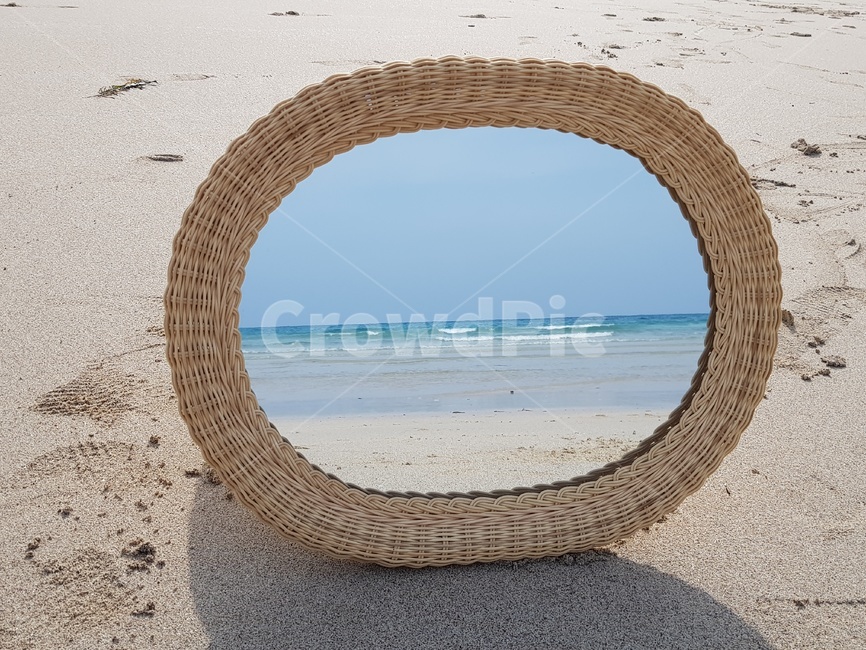 Beach,ocean,sandy beach,rattan mirror,emerald sea