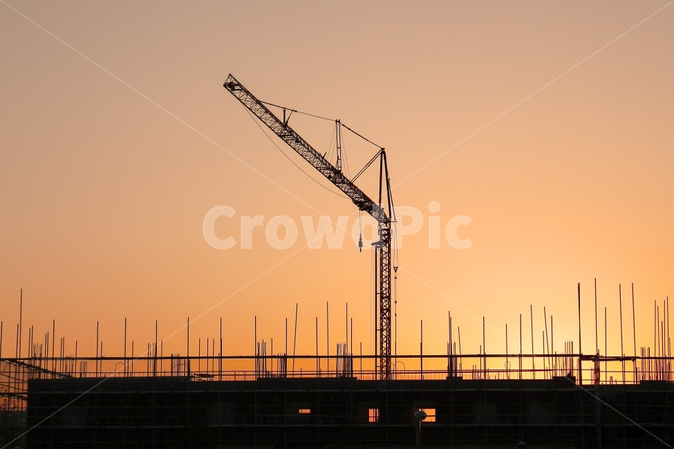 building trade,building,cable,tower,sky,crane,development,scaffolding,town,lower,equipment,construction site,weight,engineering,labor,silhouette,lift,job,high rise,glow,Tower crane,steel,activity,backlight,industry,sun,exterior wall,load,construction,arch