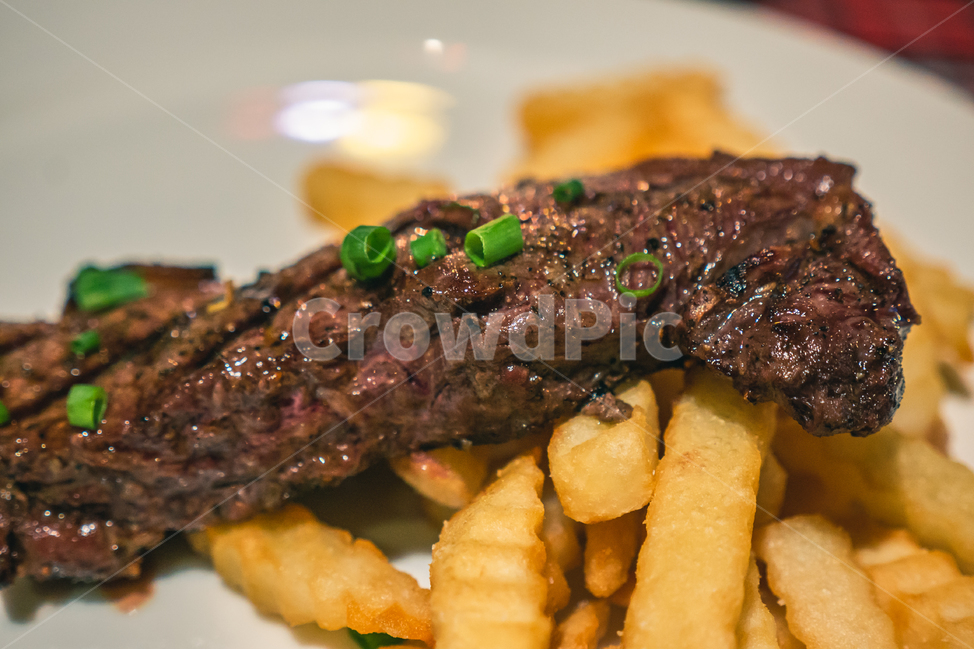 ny steak,steak,restaurant,beef,cow,delicious,food,French fries,Beef Steak,New York Steak,luxury restaurant