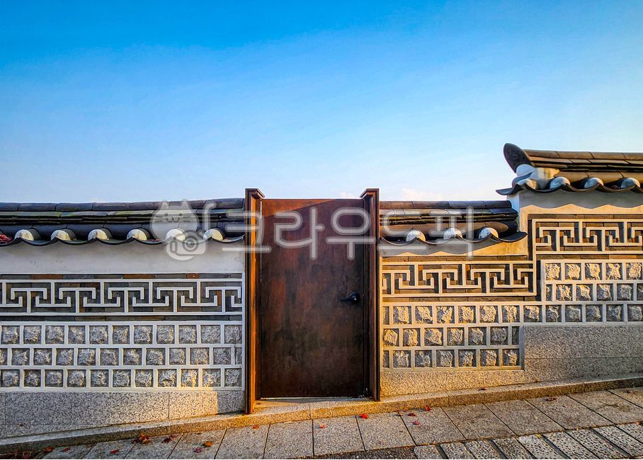 Stone wall,stone wall road,Hanok,tradition,wall,gate,iron gate,rusty,vintage,sensibility,Korean,traditional house,roof tile,fence,alley,alleyway,background,texture,countryside,quiet,door,entrance,old,retro,tightly closed,blue sky,