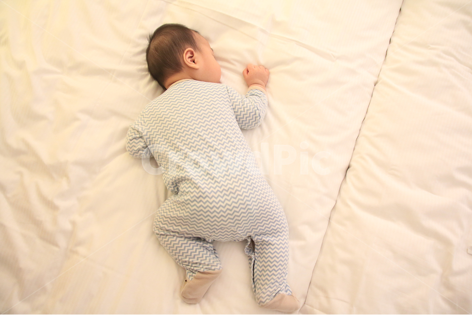 small,bed,dreamland,baby boy,deep sleep,pose,posture,hotel bed,cute,sleeping,sleep,bedding,white,baby,hotel,linen,family,parenting,adorable