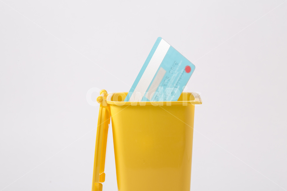 Credit card,trash can,yellow,card,trash