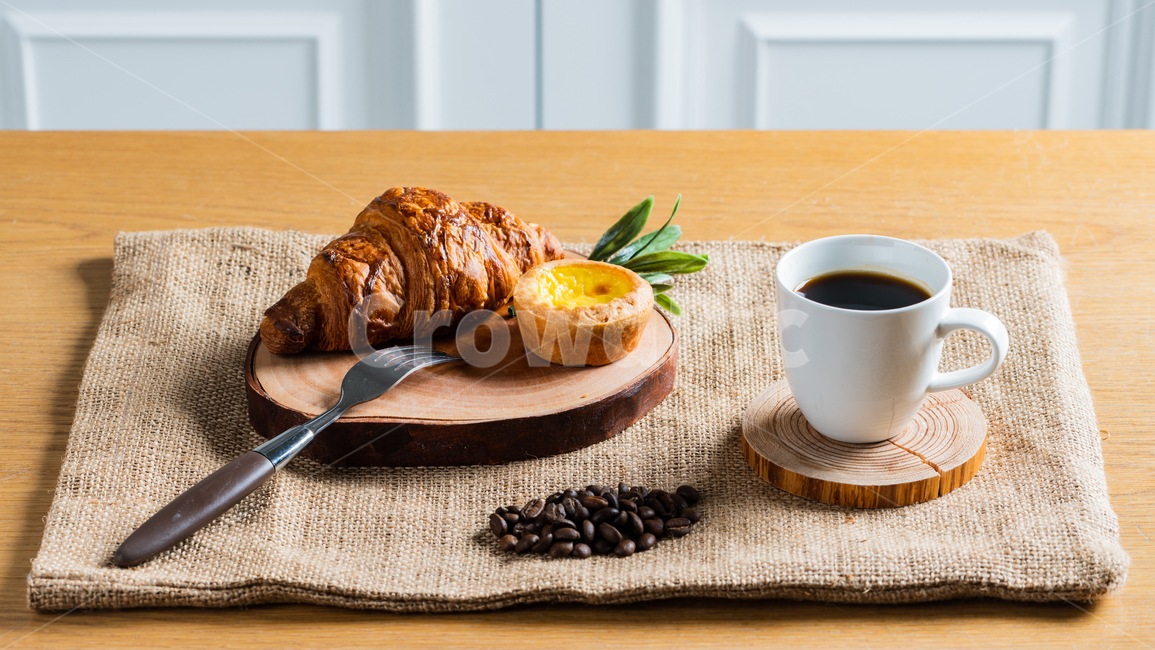 tablecloth,Meal,inside,interior,coffee beans,hungry,modern,coffee cup,neat,kitchen,table,Woodenware,bread,green,tree,equipment,leaf,delicious,food,Lunch,Tray,pastry,fork,White,mug cup,brunch,coffee,organized,breakfast,sweet