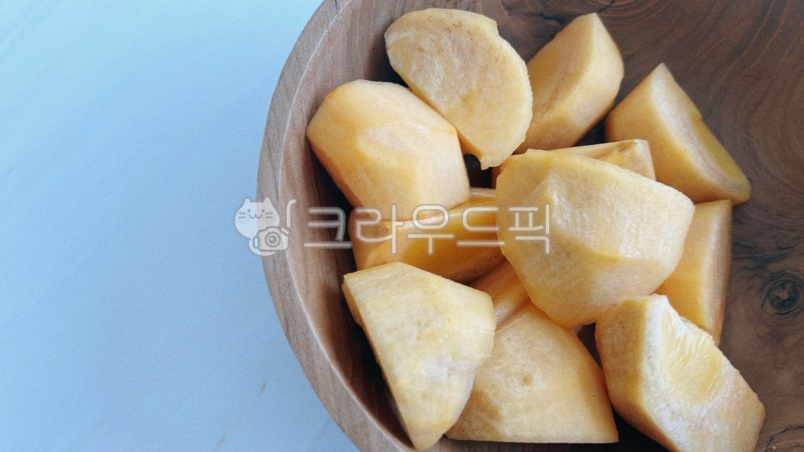 fall fruit,Fall seasonal fruits,sweet persimmon,fall food,fruit,persimmon,Shaved persimmon,wooden bowl,wood ball