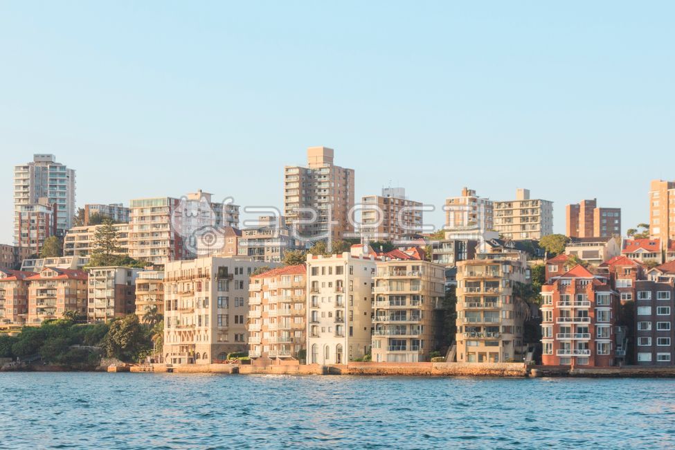 tide,Ocean view,mood,coastal city,sunshine,building,wave,oversea,sandy beach,sight,cityscape,quiet,high rise building,building forest,coastline,windless,View,coast,ocean,Panorama,waterfront,apartment,sea level,landscape,Sunny