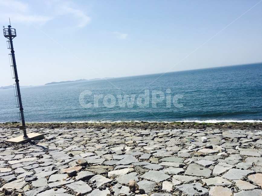 Beach,ocean,clean sky,emerald color,sea