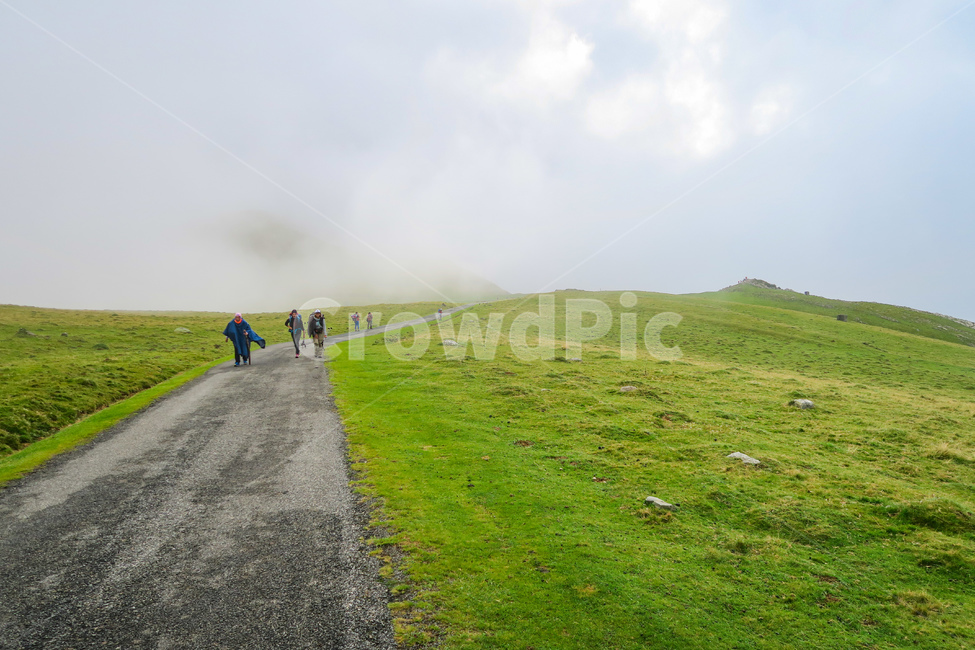 pyrenees,caminodesantiago,Santiago pilgrimage route,pilgrimage,Pebble,road,human,dirt road,dirtroad,pilgrim,grassland,Spain,peregrino,gravel,field,outdoors,person,road name,Pyrenees,pilgrimage route