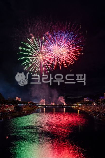 fireworks,water,building,urban,waterfront,cityscape,flame,architecture