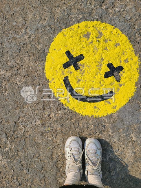 Smile,laughter,face,moon,painting,drawing,asphalt,smile face,graffiti,floor painting,street feeling,cheerful photo,expression of emotion,x-eye,sneakers,casual moment,foot shot,city feeling,street photo,funny graffiti,yellow smile,graf