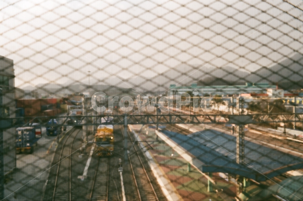 train station,sight,wire netting,train track,train,morning