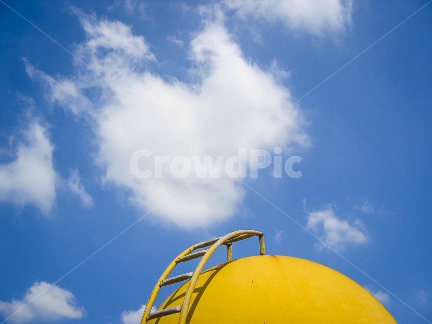 sky,cloud,water tank,ascent,white clouds,stairs,yellow,watertank