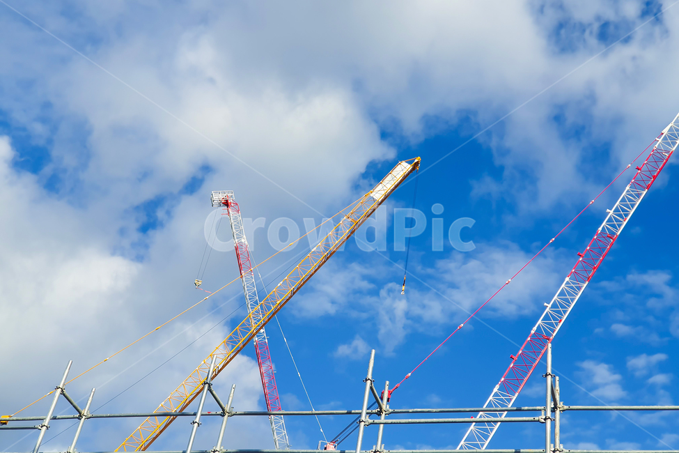 sky,blue sky,crane,business,Foundation construction,yellow,construction site,industry,construction crane,cloud,blue,Construction site,rebar,safety,regional development,constructioncrane,Development,tower crane