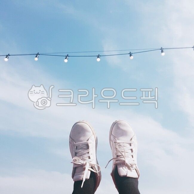 sky,cloud,footwear,white shoes,background,bulb,shoes,foot,Sky blue