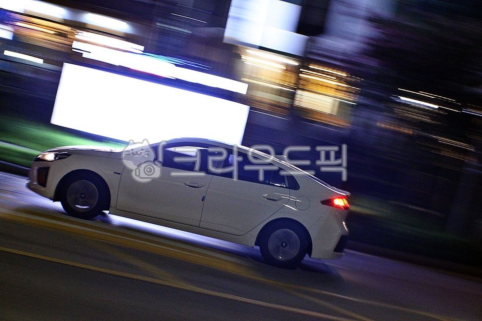 night view,panning shot,car,a speeding car,vehicle