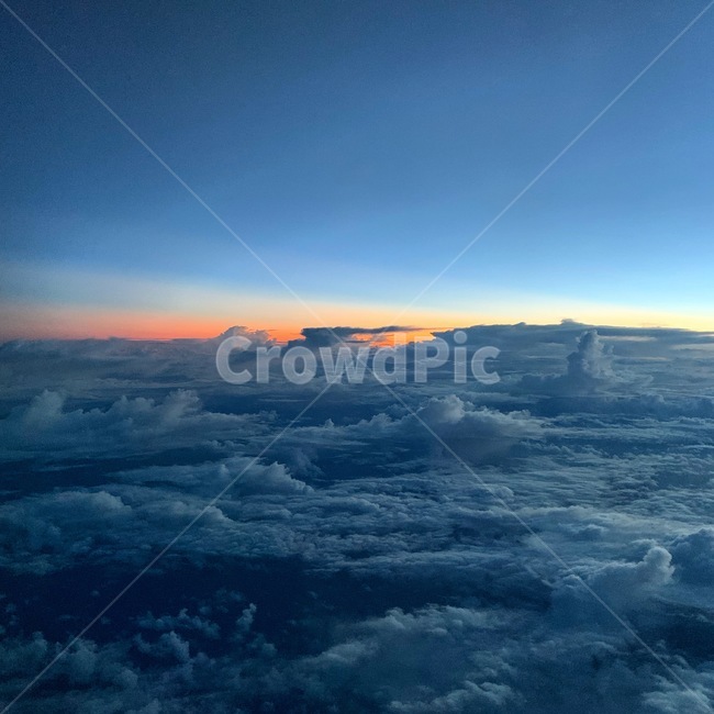 sky,airplane shot,color,cloud,airplane window,dawn sky,Above the sky,airplane,sunset,sight,window,sky scenery,cloud scenery,Inside the plane