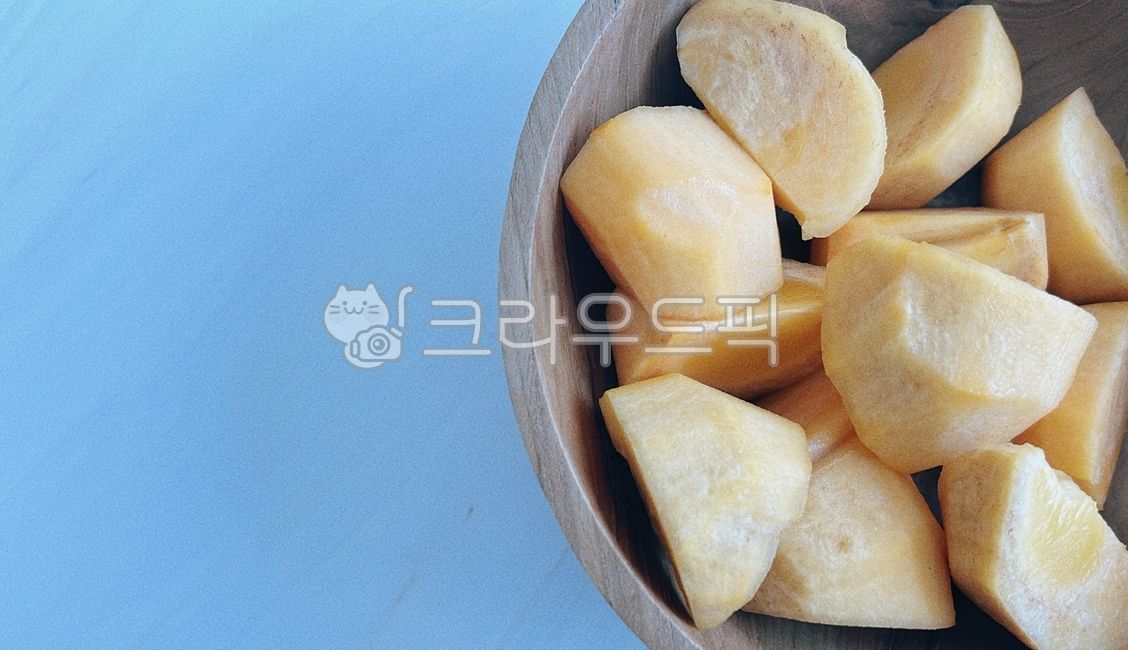 fall fruit,Fall seasonal fruits,sweet persimmon,fall food,fruit,persimmon,Shaved persimmon,wooden bowl,wood ball