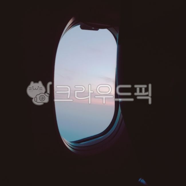 flight,pink,pinkcloud,out the window,cloud,pink clouds,sky,pink sky,airplane interior,airplane window,blue,airplane,sunset,window,Sky blue