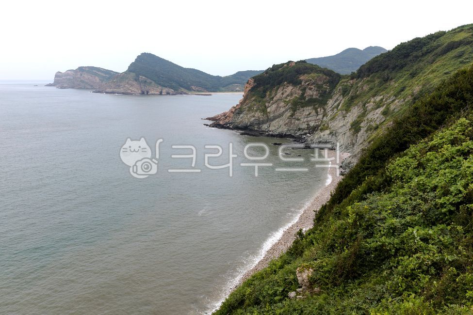 headland,nature,cliff,water,sea,rock,promontory,mountain,outdoors,ocean,weather,fog,Fog