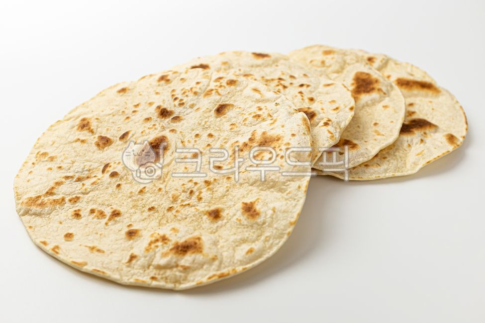 close up,I am,bread,butter,Chewy,Butter naan,savory,level,Indian food,Indian bread,food,meal,flatbread,Indian culture,flour,plain,grocery,Food Ingredients,ingredients