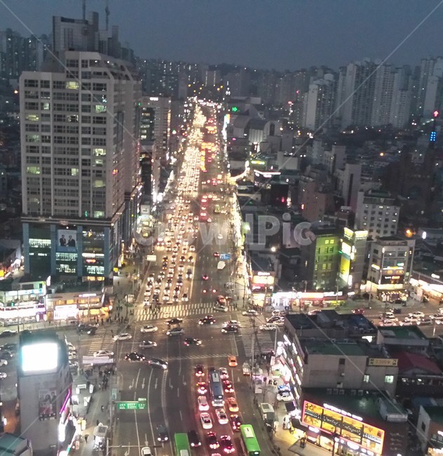 night view,intersection,on the road,building rooftop,differential