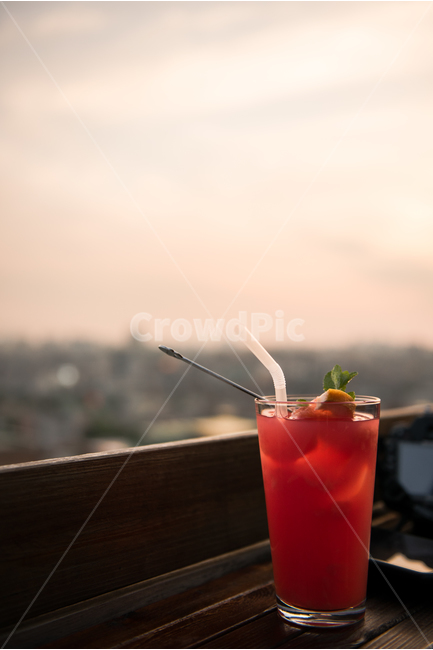 rest,cool,Magic hour,dinner,early evening,Orange,summer,healing,cafe,Rooftop Cafe,beverage,sunset,sight,rooftop,cityveiw,Grapefruit Ade,cup