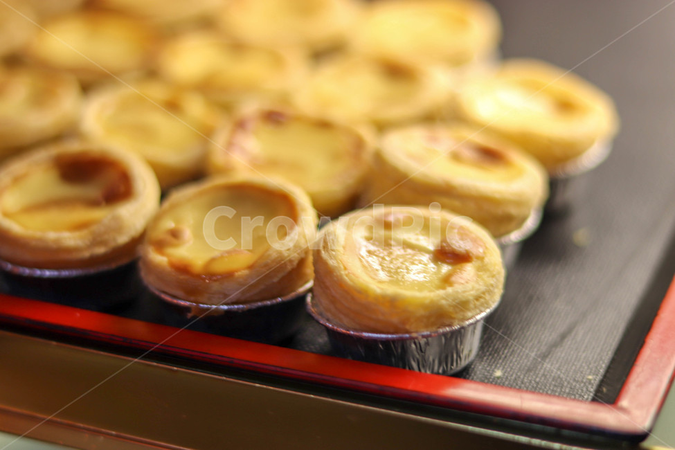 bread,bakery,dessert,tart,egg tart