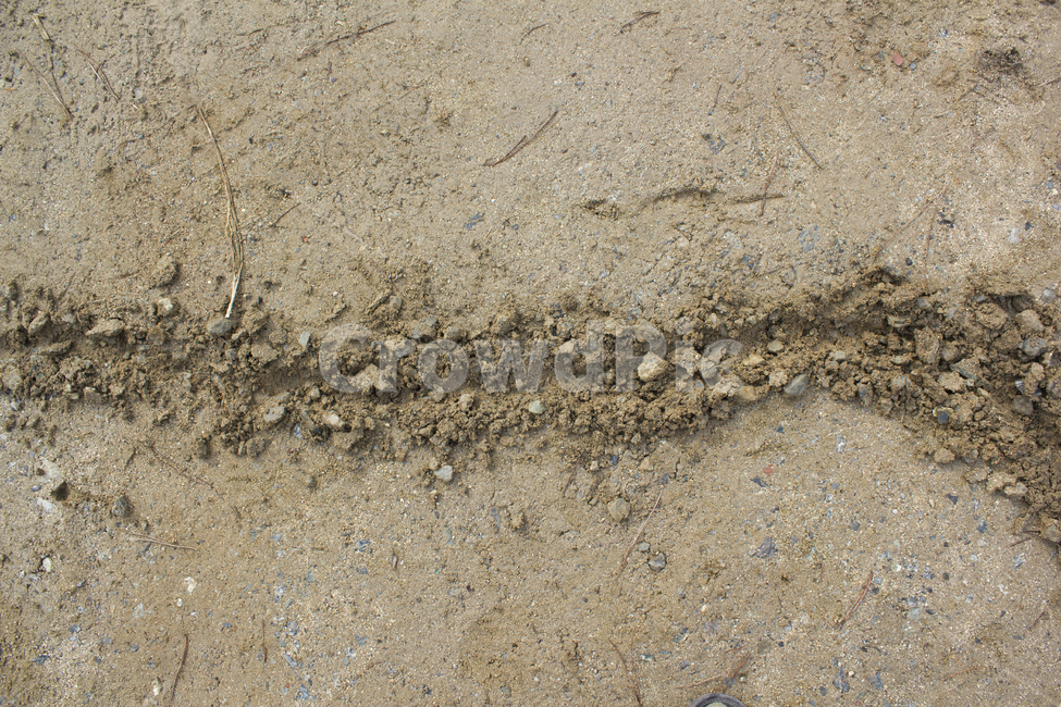 dug up,line,draw a line,soil,top angle,farmland,earths surface,rock,drawing,floor,tower,close up,top view,surface,nature,texture,digging,brown,stone,sand,sandy bottom,dirt floor,dug,earth,ground,mark
