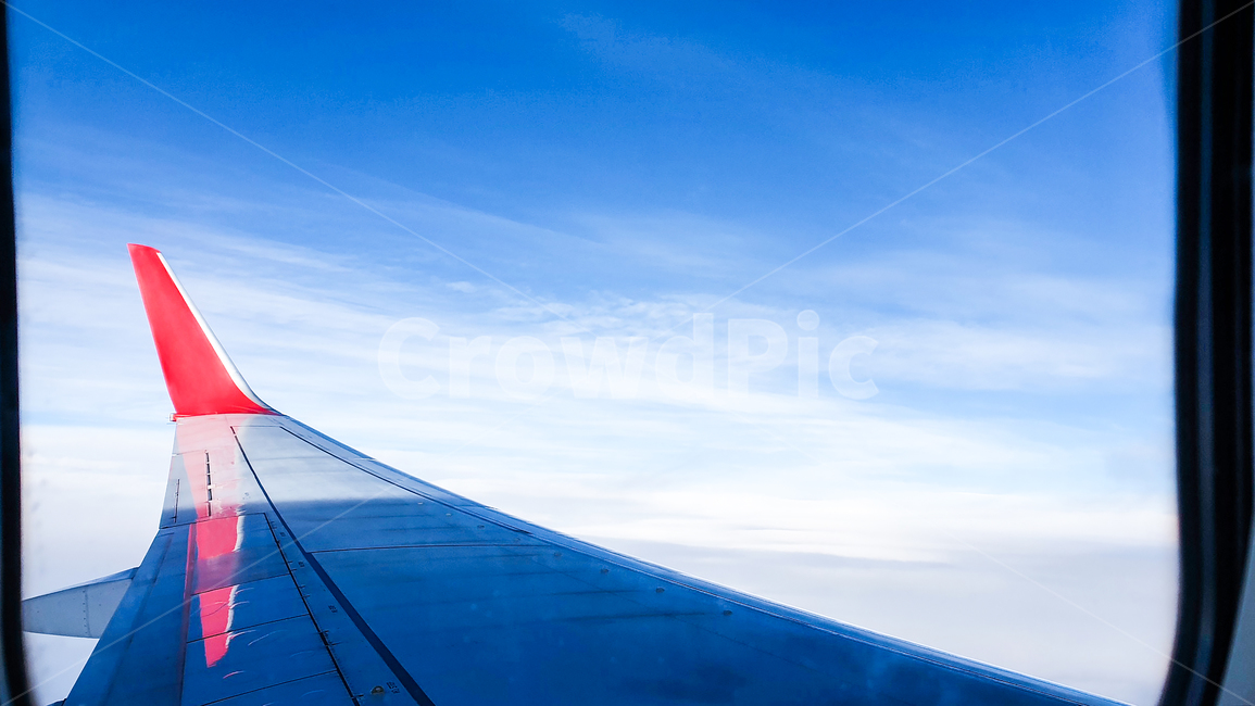 sky,blue sky,Transportation,cloud,airplane wings,trip,White,blue,vacation,wing,travel,traffic