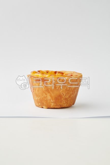 bread,pastry,bakery,dessert,tart,egg tart