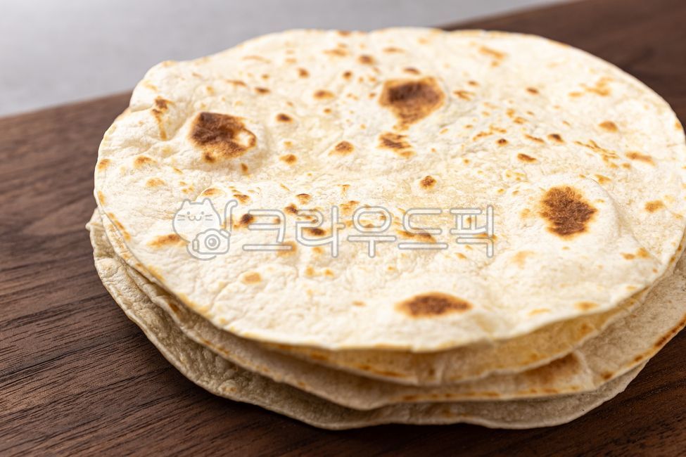 close up,I am,bread,butter,Chewy,Butter naan,savory,level,Indian food,Indian bread,food,meal,flatbread,Indian culture,flour,plain,grocery,Food Ingredients,ingredients