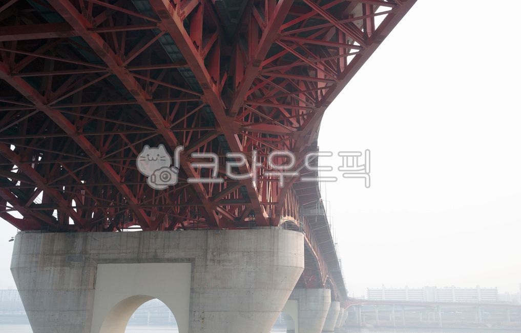 concrete,city,Seongsu Bridge,winter,blur,iron fence,air,scenery,pier,road,han river,traffic,bridge pillar,sky,apt,water,structure,outdoor,cement,apartment complex,outdoors,outside,bridge,river,under the bridge,apartment