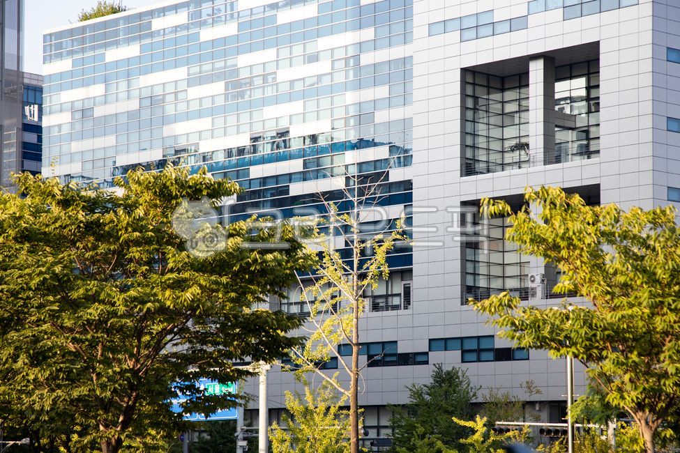 atmosphere,colored glass,glass,framing,distance,city,sign,downtown,construct,building,transparent,interior,outer wall,skeleton,view,Pillar,colonnade,sash,design,clairvoyance,road name,Street
